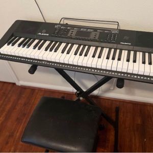 Alesis Piano keyboard for sale- works perfectly. Comes with stool.